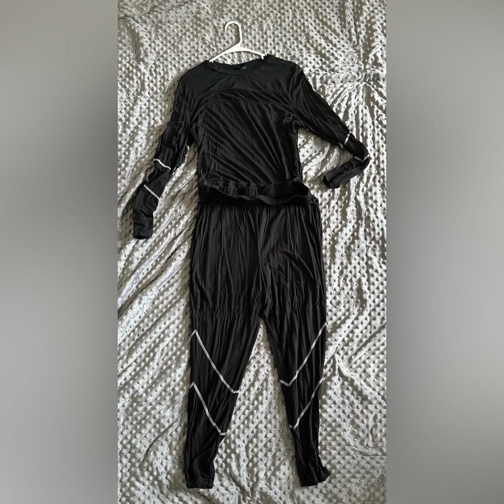 Lightweight jogging suit… two piece with sheer inlets.
